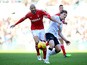 Kelvin Wilson of Nottingha m Forest (L) in action with Chris Martin of Derby during the Sky Bet Championship Match between Derby County and Nottingham Forest at iPro Stadium on January 17, 2015