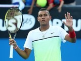Nick Kyrgios waves to the crowd after his second-round victory on day three of the Australian Open on January 21, 2015