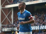 Lee McCulloch of Rangers runs off to celebrate after scoring during the Scottish Championship League Match between Rangers and Dumbarton, at Ibrox Stadium on August 23, 2014