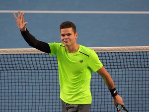 Canada's Milos Raonic celebrates after victory in his men's singles match against Spain's Feliciano Lopez on day eight of the 2015 Australian Open tennis tournament in Melbourne on January 26, 2015