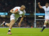 England's centre Jonathan Joseph scores a try during the Six Nations international rugby union match between Wales and England at the Millennium Stadium in Cardiff, south Wales, on February 6, 2015