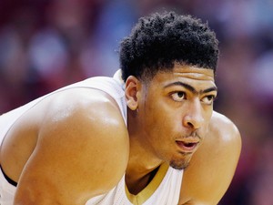 Anthony Davis #23 of the New Orleans Pelicans waits on the court during their game against the Houston Rockets on December 15, 2014