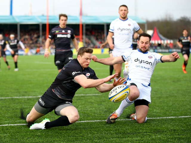 Chris Ashton of Saracens dives in to score a try during the Aviva Premiership match between Saracens and Bath Rugby at Allianz Park on February 15, 2015