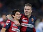 Diego Perotti with his teammate Juraj Kucka of Genoa CFC celebrates after scoring the opening goal from penalty spot during the Serie A match between SS Lazio and Genoa CFC at Stadio Olimpico on February 9, 2015