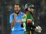 India cricketer Munaf Patel reacts after taking the wicket of Bangladesh cricket captain Shakib Al Hasan during the first match in the World Cup on February 19, 2011