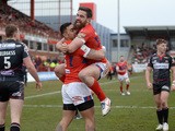 Ken Sio of Hull Kingston Rovers celebrates his opening try with Tyrone McCarthy during the First Utility Super League match between Hull KR and Wigan at Craven Park on March 1, 2015