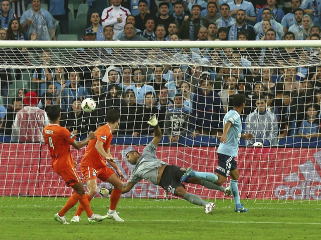 Alex Brosque of Sydney FC scores his teams fifth goal during the round 21 A-League match between Sydney FC and Brisbane Roar at Allianz Stadium on March 15, 2015