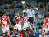 Marc Janko and Sebastian Ryall of Sydney FC are challenged Patrick Kisnorbo (L) and Kew Jaliens (R) of Melbourne City during the round 22 A-League match between Sydney FC and Melbourne City FC at Allianz Stadium on March 20, 2015