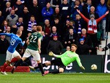 Rangers forward Kenny Miller slots the ball past Hibs goalkeeper Mark Oxley for the second goal during the Scottish Championship match between Hibernian and Rangers at Easter Road on March 22, 2015
