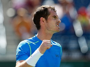 Andy Murray of Great Britain celebrates defeating Philipp Kohlschreiber of Germany during day eight of the BNP Paribas Open tennis at the Indian Wells Tennis Garden on March 16, 2015