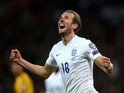 Harry Kane of England celebrates after scoring on his debut during the EURO 2016 Qualifier match between England and Lithuania at Wembley Stadium on March 27, 2015