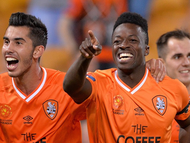 Kofi Danning of the Roar celebrates after scoring a goal during the round 27 A-League match between the Brisbane Roar and the Newcastle Jets at Suncorp Stadium on April 24, 2015
