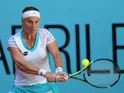 Svetlana Kuznetsova of Russia plays a backhand against Lucie Safarova of the Czech Republic in their quarter final round match during day six of the Mutua Madrid Open tennis tournament at the Caja Magica on May 7, 2015