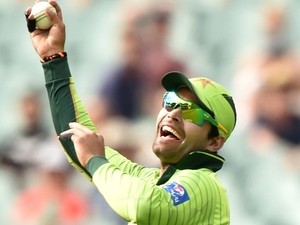 Umar Akmal of Pakistan celebrates catching out Stuart Thompson of Ireland in the 2015 Cricket World Cup Pool B match between Pakistan and Ireland at the Adelaide Oval on March 15, 2015