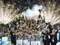 Juventus' players celebrate with the Italian League's trophy during a ceremony following the Italian Serie A football match Juventus vs Napoli on May 23, 201