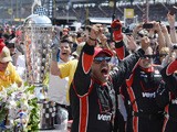 Juan Pablo Montoya of Colombia driver of the #2 Team Penske Chevrolet Dallara celebrates after winning the 99th running of the Indianapolis 500 mile race at the Indianapolis Motor Speedway on May 24, 2015