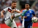 US midfielder Juan Agudelo and Germany's midfielder Skodran Mustafi (L) vie for the ball during the International friendly football match between Germany and the USA in Cologne, western Germany on June10, 2015