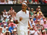 Roger Federer of Switzerland reacts during his Gentlemens Singles Second Round match against Sam Querry of the United States during day four of the Wimbledon Lawn Tennis Championships at the All England Lawn Tennis and Croquet Club on July 2, 2015