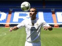 Brazilian Danilo plays with the ball during his presentation as new player of Real Madrid Football Club at Santiago Bernabeu stadium in Madrid on July 9, 2015