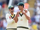 Australia bowler Mitchell Starc celebrates his five wicket haul with Nathan Lyon during day two of the 1st Investec Ashes Test match between England and Australia at SWALEC Stadium on July 9, 2015