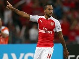 Theo Walcott of Arsenal celebrates after scoring against Everton during the Barclays Asia Trophy final match between Arsenal and Everton at the National Stadium on July 18, 2015