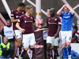 Sam Nicholson, of Hearts celebrates with team mate Morgaro Gomis after scoring during the Ladbrokes Scottish Premiership match between Heart of Midlothian FC and St Johnstone FC at Tynecastle Stadium on August 2, 2015