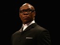Chris Eubank looks on before his son Chris Eubank Jnr fights Dmitry Chudinov for the WBA Interim World Middleweight Championship at the O2 Arena on February 28, 2015 in London, England. 