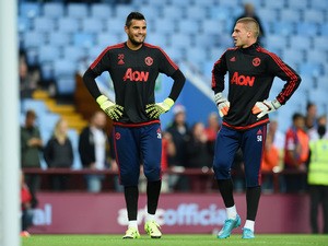Sergio Romero of Manchester United with Sam Johnstone of Manchester United prior to the Barclays Premier League match between Aston Villa and Manchester United on August 14, 2015