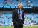 Chelsea boss Jose Mourinho surveys the scene ahead of the game with Man City on August 16, 2015