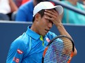 Kei Nishikori of Japan reacts against Benoit Paire of France during their Men's Single First Round match on Day One of the 2015 US Open at the USTA Billie Jean King National Tennis Center on August 31, 2015