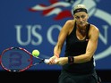 Petra Kvitova of the Czech Republic plays a backhand during her first round match against Laura Siegemund of Germany on Day Two of the 2015 US Open at the USTA Billie Jean King National Tennis Center on September 1, 2015 in the Flushing neighborhood of th