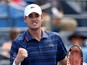 John Isner of the United States reacts after defeating Malek Jaziri of Tunisia during their Men's Singles First Round match on Day Two of the 2015 US Open at the USTA Billie Jean King National Tennis Center on September 1, 2015