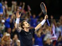 Andy Murray of Great Britain celebrates victory in his match against Bernard Tomic of Australia during Day Three of the Davis Cup Semi Final match between Great Britain and Australia at Emirates Arena on September 20, 2015