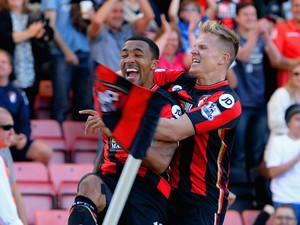 Callum Wilson (L) of Bournemouth celebrates scoring his team's first goal with his team mate Matt Ritchie (R) during the Barclays Premier League match between A.F.C. Bournemouth and Sunderland at Vitality Stadium on September 19, 2015 in Bournemouth, Unit