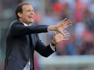 Juventus' coach Massimiliano Allegri gestures during the Italian Serie A football match between Genoa and Juventus on September 20, 2015