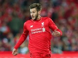 Adam Lallana of Liverpool FC looks to pass the ball during the international friendly match between Adelaide United and Liverpool FC at Adelaide Oval on July 20, 2015