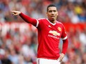 Chris Smalling of Manchester United gives instructions during the Barclays Premier League match between Manchester United and Newcastle United at Old Trafford on August 22, 2015 in Manchester, United Kingdom.