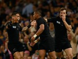 Waisake Naholo (C) of the New Zealand All Blacks celebrates scoring the opening try with Conrad Smith and Aaron Smith (L) of the New Zealand All Blacks during the 2015 Rugby World Cup Pool C match between New Zealand and Georgia at the Millennium Stadium 