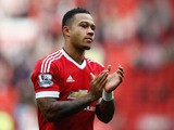 Memphis Depay of Manchester United celebrates his team's 3-0 win in the Barclays Premier League match between Manchester United and Sunderland at Old Trafford on September 26, 2015 in Manchester, United Kingdom.