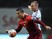 Portugal's forward Cristiano Ronaldo (L) vies with Denmark's defender Lars Jacobsen during the Euro 2016 qualifying football match Portugal vs Denmark at the Municipal stadium in Braga on October 8, 2015. 