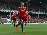 Morgan Schneiderlin of Manchester United celebrates scoring his team's first goal during the Barclays Premier League match between Everton and Manchester United at Goodison Park on October 17, 2015