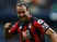 Glenn Murray of Bournemouth celebrates scoring his team's first goal during the Barclays Premier League match between Manchester City and A.F.C. Bournemouth at Etihad Stadium on October 17, 2015