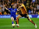 Kevin McDonald of Wolverhampton Wanderers beats the challenge from Alan Judge of Brentford during the Sky Bet Championship match between Wolverhampton Wanderers and Brentford at Molineux on October 21, 2015 in Wolverhampton, England.