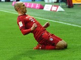 Bayern Munich's Dutch midfielder Arjen Robben celebrates scoring during the German first division football Bundesliga match between FC Bayern Munich and FC Cologne on October 24, 2015