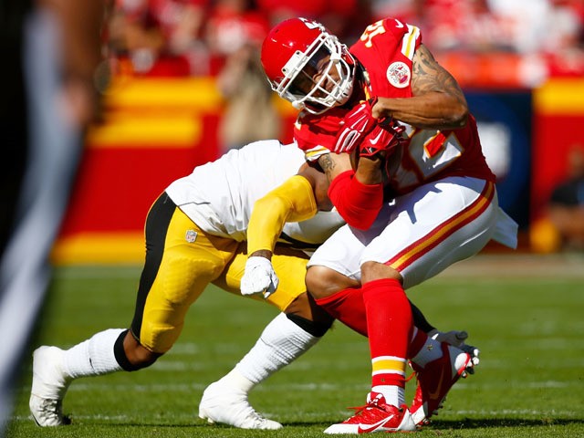 Albert Wilson #12 of the Kansas City Chiefs is tackled by Antwon Blake #41 of the Pittsburgh Steelers at Arrowhead Stadium during the second quarter of the game on October 25, 2015