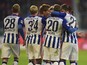 Berlin's German midfielder Mitchell Weiser (2nd R) celebrates scoring the opening goal with his team-mates during the German first division football Bundesliga match between FC Ingolstadt and Hertha BSC Berlin on October 24, 2015 in Ingolstadt, southern G