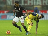 Carlos Bacca of AC Milan is challenged by Lucas Nahuel Castro of AC Chievo Verona during the Serie A match between AC Milan and AC Chievo Verona at Stadio Giuseppe Meazza on October 28, 2015 in Milan, Italy. 