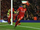 Nathaniel Clyne of Liverpool turns away after scoring the opening goal during the Capital One Cup Fourth Round match between Liverpool and AFC Bournemouth at Anfield on October 28, 2015 in Liverpool, England.