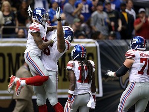 Odell Beckham #13 of the New York Giants celebrates a touchdown with teammates during the third quarter of a game against the New Orleans Saints at the Mercedes-Benz Superdome on November 1, 2015