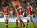 Benfica's Belgian midfielder Mehdi Carcela Gonzalez (2ndL) celebrates with his teammates after scored against Boavista FC during the Portuguese league football match SL Benfica vs Boavista FC at the Luz stadium in Lisbon on November 8, 2015